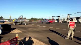 P-51 mustang, V-22 osprey, and F-94 star fire pass by before parking.