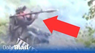 Panicking Russian soldiers fire wildly at attacking Ukrainians then flee in POV footage
