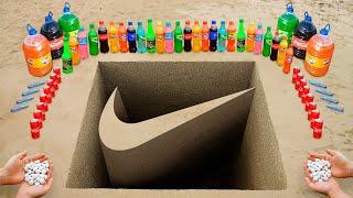 DIY Giant NIKE Logo pit with Coke, Mentos, Orbeez and Popular Sodas!