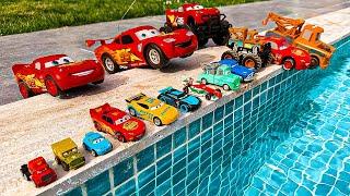 Disney Pixar Cars falling into deep pool, Lightning McQueen, Tow Mater, Mack, Sally, Francesco