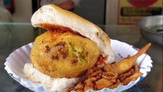 Eating Vada Pav from a street food stall near Pezari Bus Stand - Alibag