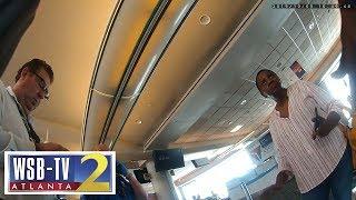 Wild raw video: Security confronts woman who boarded Delta flight without ticket or ID