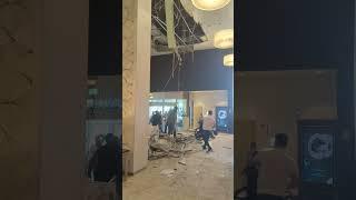 The ceiling collapses in my hotel lobby @ Hyatt Place Al Rigga, Dubai. Staff tries to cover it up.