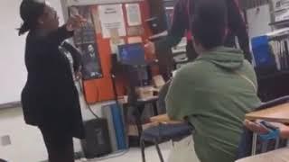 Student snatch teacher wig off in class