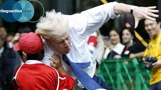 Boris Johnson knocks over boy in rugby match in Japan