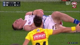 Lewis Young bumps Cam Zurhaar - AFL Round 7 2022 - Carlton vs North