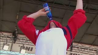 Washington Capitals' T.J. Oshie chugs a beer through his jersey at Stanley Cup rally