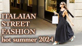 Street Fashion Italy July 2024. How people dress in Milan in the hot summer. Milan Street Style 2024