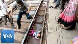 Indian Baby Survives Being Run Over by Train | VOANews
