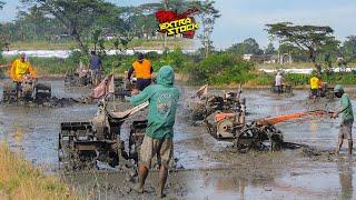 10 Hand Tractors Working Together on the Land in One Location