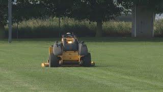 Riderless mower cutting lawns and turning heads in Ravenna