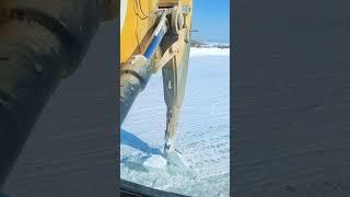 Excavate the broken stone drill to break up the ice- Good tools and machinery make work easy