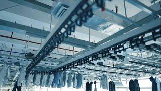 GLOBALink | Smart tech at E China clothing factory improves efficiency, working environment