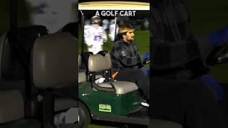 Golf cart drives on the field during a game 