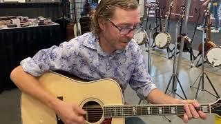 Drew Demos a $15K 100 Year Old Guitar- IBMA Bluegrass Festival Expo- Raleigh Convention Center NC