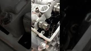 How do you remove the left hand spark plug from a Triumph Street Triple? DONCASTER MOTORCYCLES