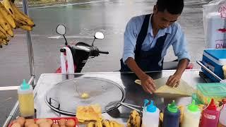 Eating Roti (Pancake) in Cambodia