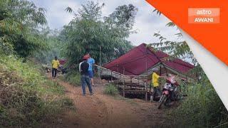 Orang Asli bina rumah bangsal atas bukit