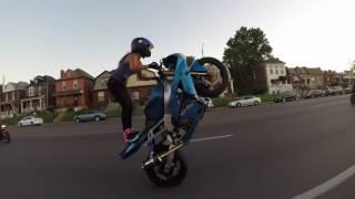 Crazy girl does motorcycle stunts  December 2016