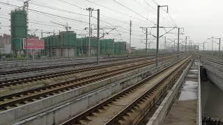 China high speed train CR400AF cut through Wuxi Dong Raiway Station by 350km/h