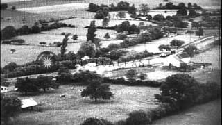 Strafing of trains, railroad yards, tug boats and barges in canals by USAAF fight...HD Stock Footage