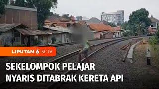 Viral! Sekelompok Pelajar Nekat Lompat Tembok & Nyaris Ditabrak Kereta | Liputan 6