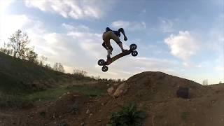 Mountainboarding the CU Boulder Research Park Bike Jumps 2012 - GoPro Hero 2