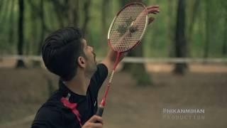 Playing badminton middle of the forest