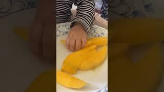 Baby girl trying mango for the first!  #babygirl #baby #cutebaby #youtubeshorts