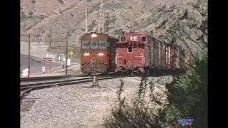 Amtrak & ATSF meet Speno railgrinder on San Bernardino Sub 1988