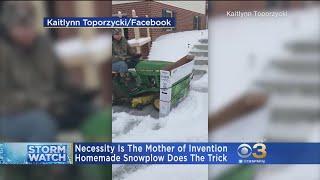 Man Creates Snow Plow Out Of TV Box, Lawn Mower