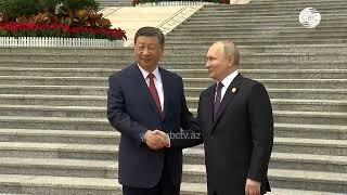 Си Цзиньпин лично встретил Путина в Пекине