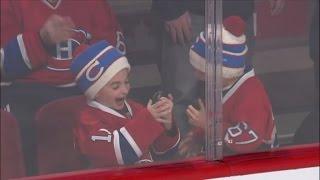 Young Hockey Fan Flips Out When Player Tosses Him a Puck