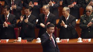 Delegates clap and sing as Xi Jinping opens Communist party congress