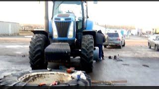 Переобуваем наш трактор New Holland 8050