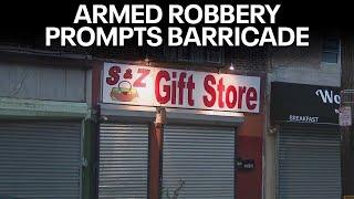 3 armed robbery suspects in bulletproof vests barricade in Philly shop