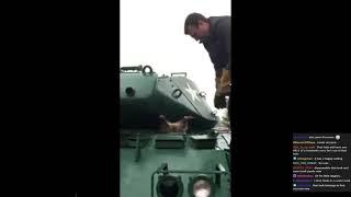 Zach watches a raccoon get unstuck from a tank