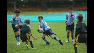 Everton and England legend Wayne Rooney’s son Kai looks handy with a rugby ball in school