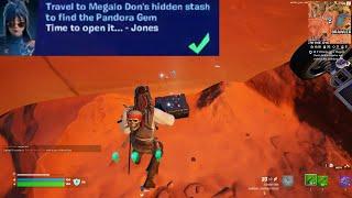 Travel to Megalo Dons hidden stash to find the Pandora Gem / Break Open hidden cache Fortnite