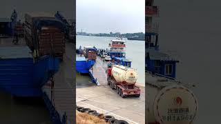 Big trucks and big tanks get on board and ferry across the river. Beautiful scenery along the river