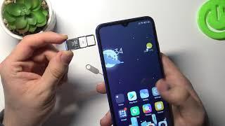 Установка SIM-карты и SD-карты памяти в Xiaomi Redmi 9AT