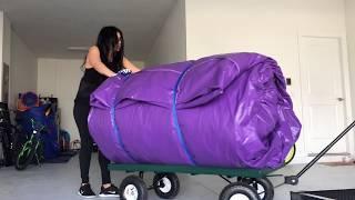 Deliver the purple waterslide bounce house 7 in 1 combo