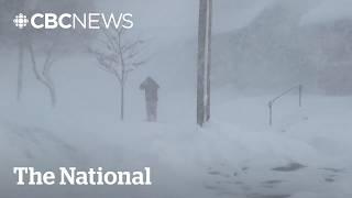 Power outages, pileups as winter storms pound U.S. Midwest, Atlantic Canada