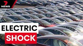Thousands of electric cars sitting idle inside Tesla graveyard | 7 News Australia