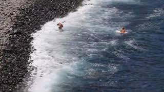 Surfers getting in / Maui