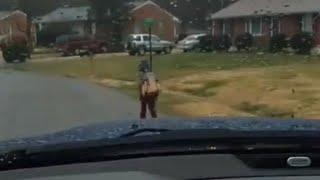 Dad teaches son a lesson, makes him run to school in rain - Daily Mail