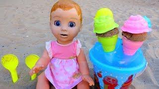 Baby doll playing with ice cream toys on the Playground. Video for kids