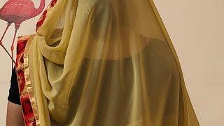 husband removing blue net saree and wearing cream georgete saree of wife.male to female crossdresser