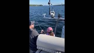 Girl reels in massive brook trout at Moosehead Lake