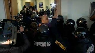 Georgian police arrest opposition leader Nika Melia after storming HQ